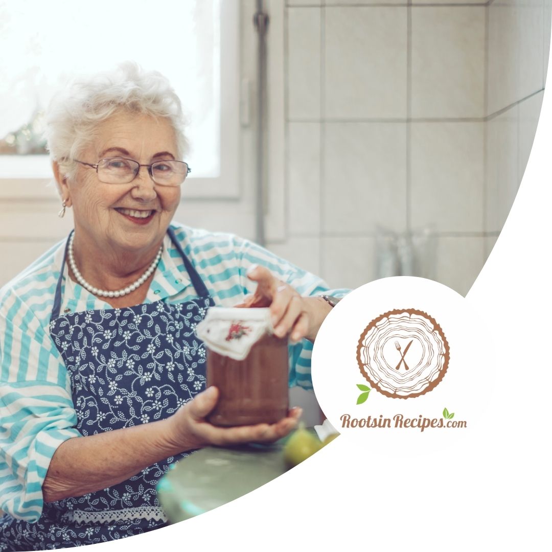 grandma chef in the kitchen with a jar of jam